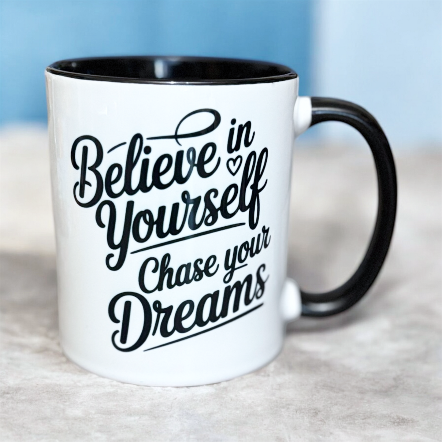 Be Unstoppable mug showing motivational quote with black interior and handle hand printed UK