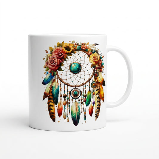 Illustrated Solutions Store 11oz ceramic mug with a boho floral dreamcatcher design, turquoise center, and roses.