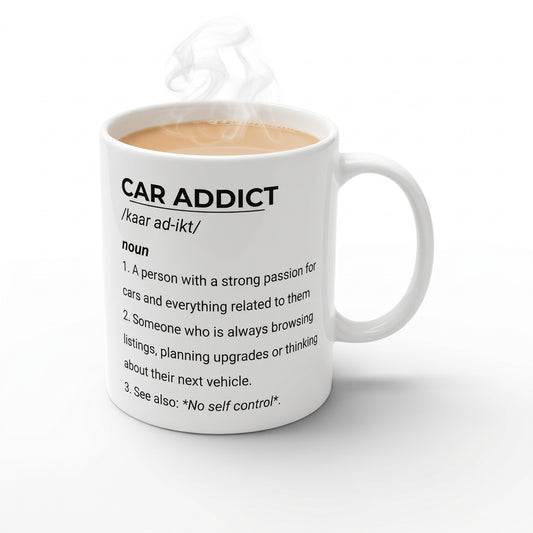 Illustrated Solutions Store white ceramic mug featuring a humorous Car Addict dictionary definition print