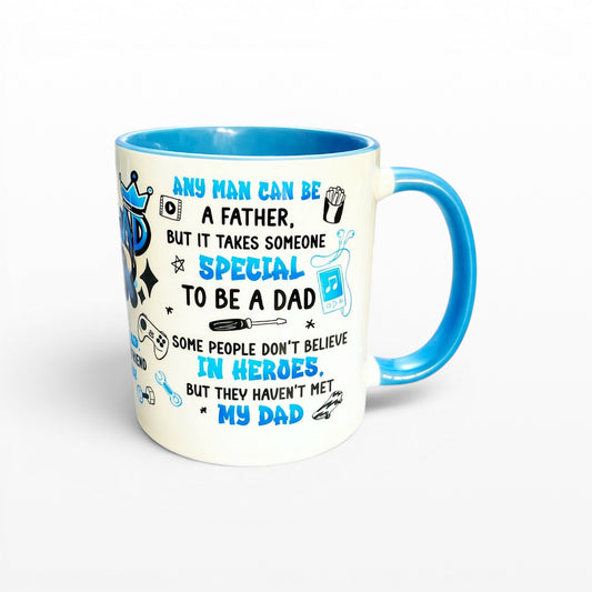 Illustrated Solutions Store white ceramic mug with blue interior and handle, featuring