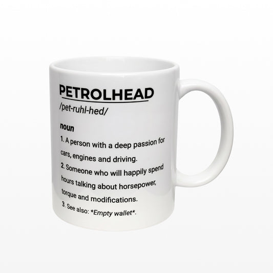 Illustrated Solutions Store white ceramic mug featuring a humorous dictionary definition of a petrolhead for car lovers.