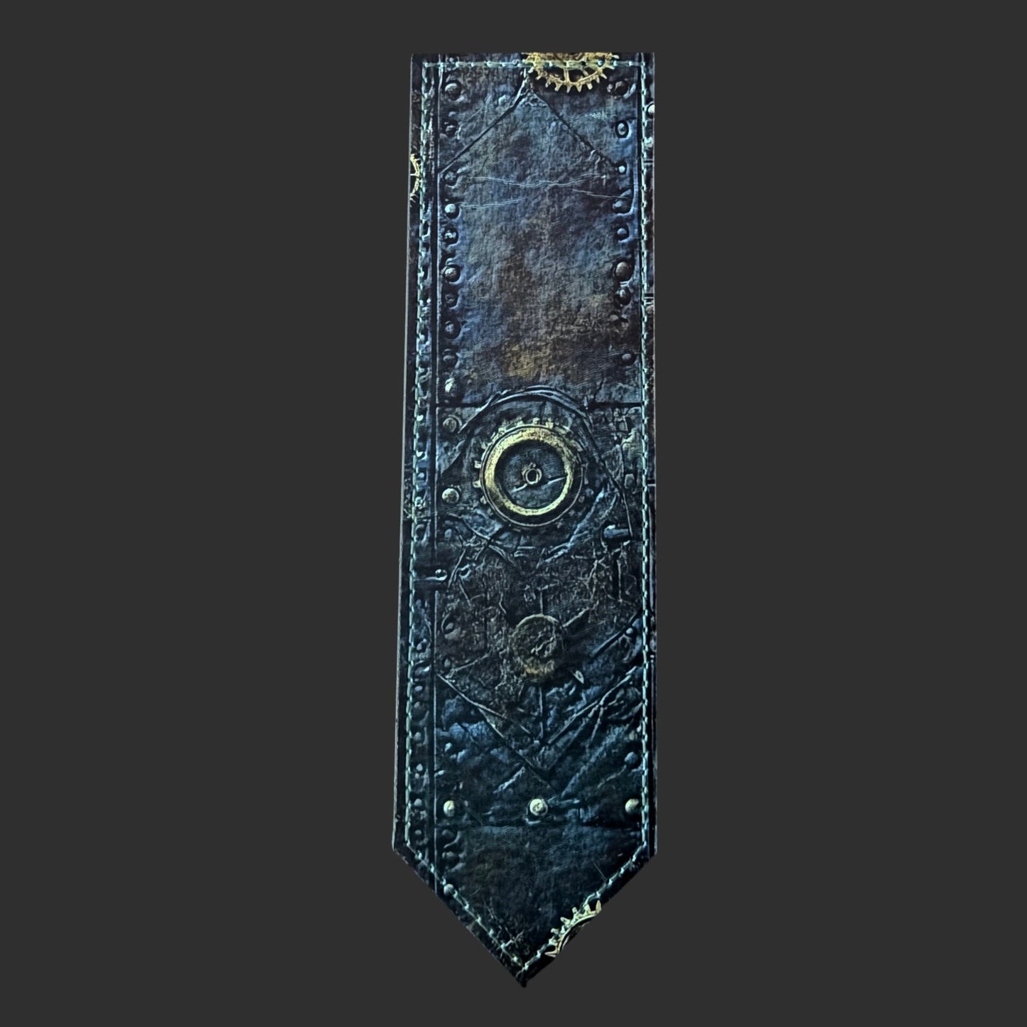 Illustrated Solutions Store steampunk leather bookmark featuring weathered metal panels, industrial gears, and rivets.