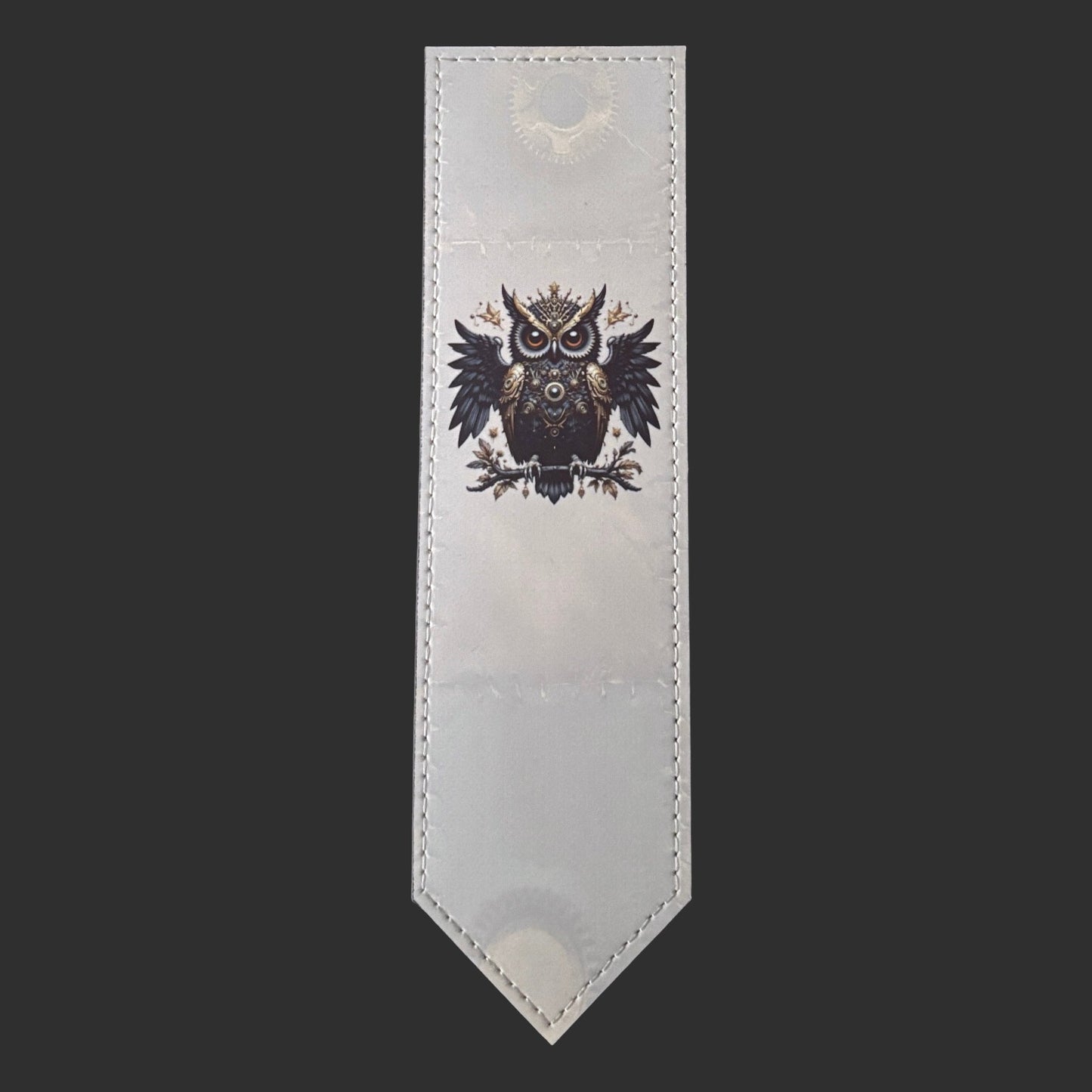 Illustrated Solutions Store steampunk leather bookmark featuring a detailed black owl with Victorian industrial motifs.