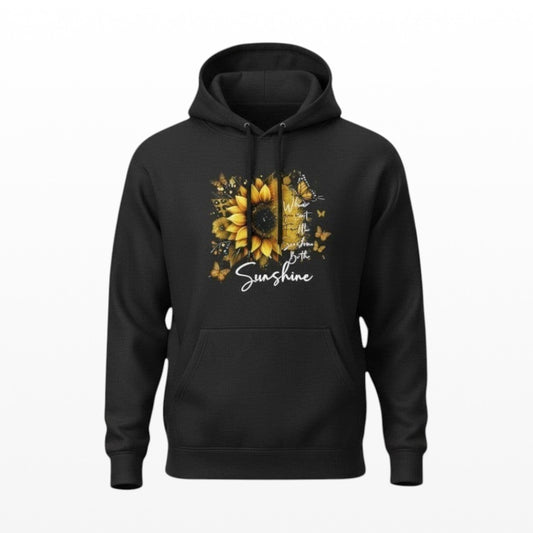 Illustrated Solutions Store black hoodie with a sunflower and butterfly graphic that says "When you can't find the sunshine, be the sunshine."