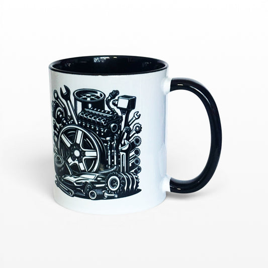 Illustrated Solutions Store white ceramic mug with black interior and handle, featuring a detailed black graphic of car engine parts, tools, and a sports car.