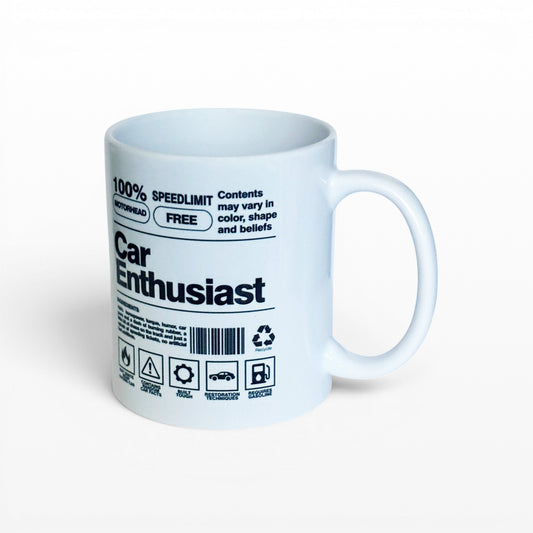 Illustrated Solutions Store white ceramic mug with 'Car Enthusiast' text and automotive icons.