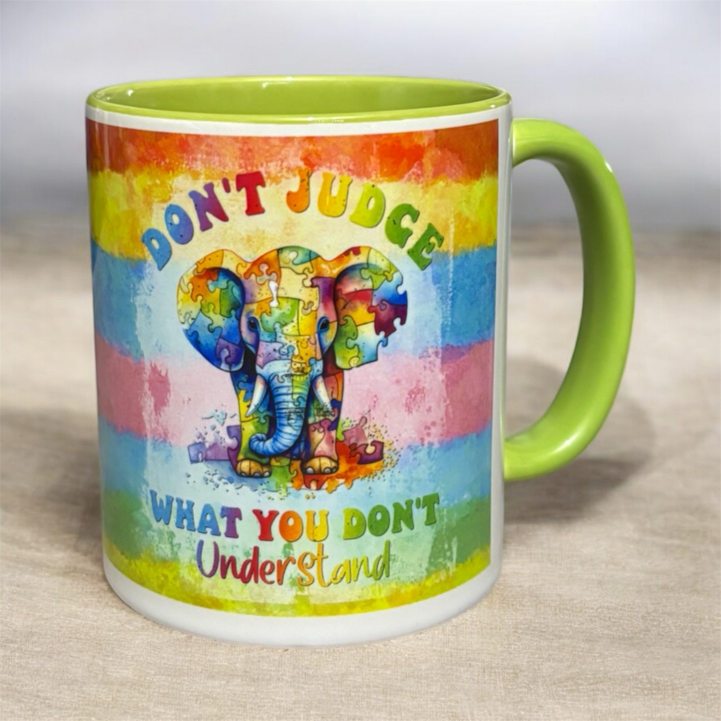 2-tone inner and handle light green ceramic mug with an elephant design and motivational quote hand printed in the UK