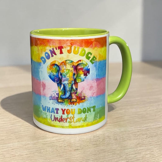 2-tone inner and handle light green ceramic mug with an elephant design and motivational quote hand printed in the UK