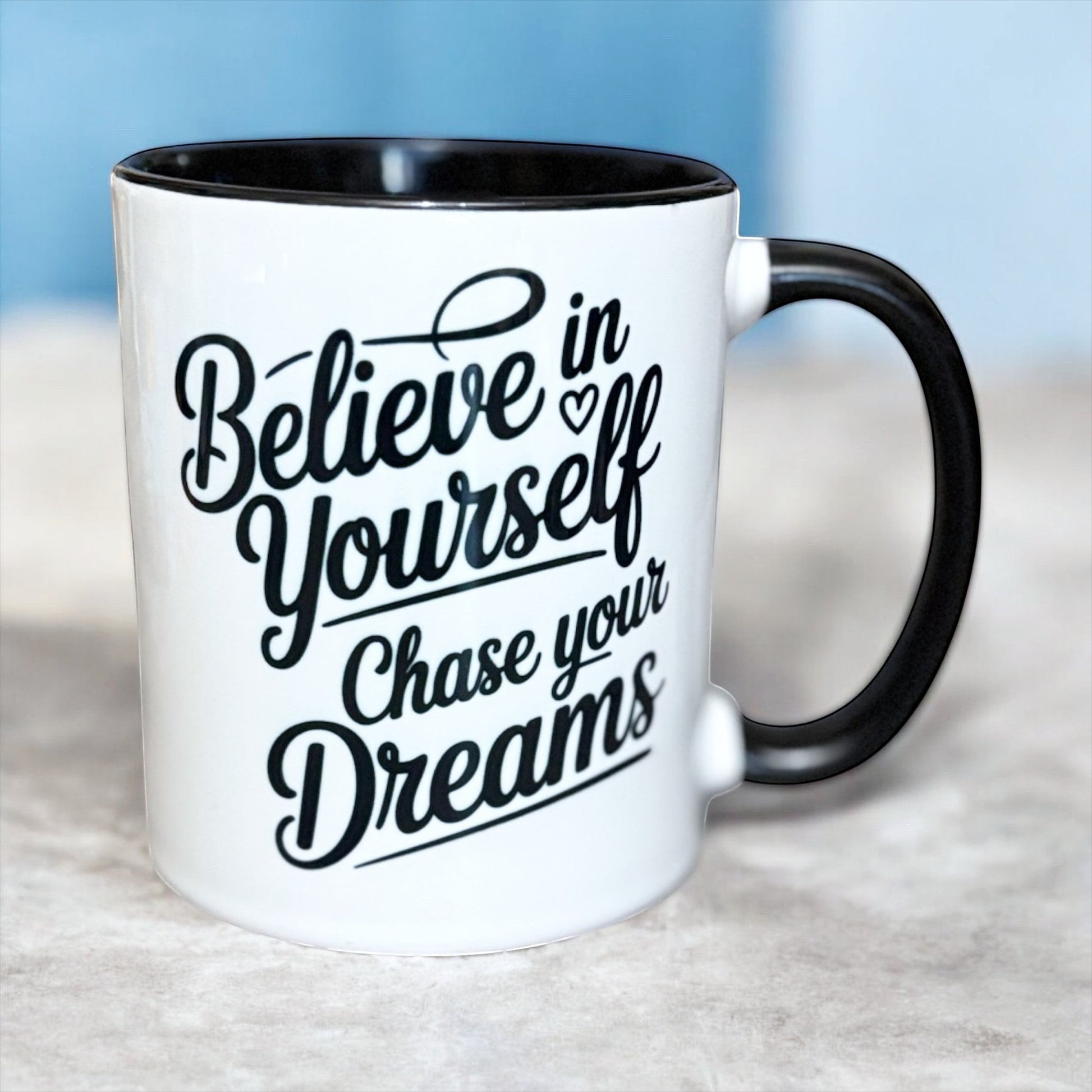 Be Unstoppable mug showing motivational quote with black interior and handle hand printed UK