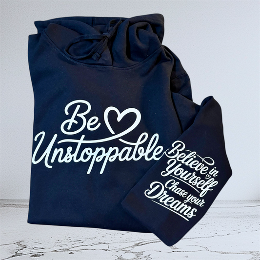 Close up of Be Unstoppable navy hoodie hand pressed UK