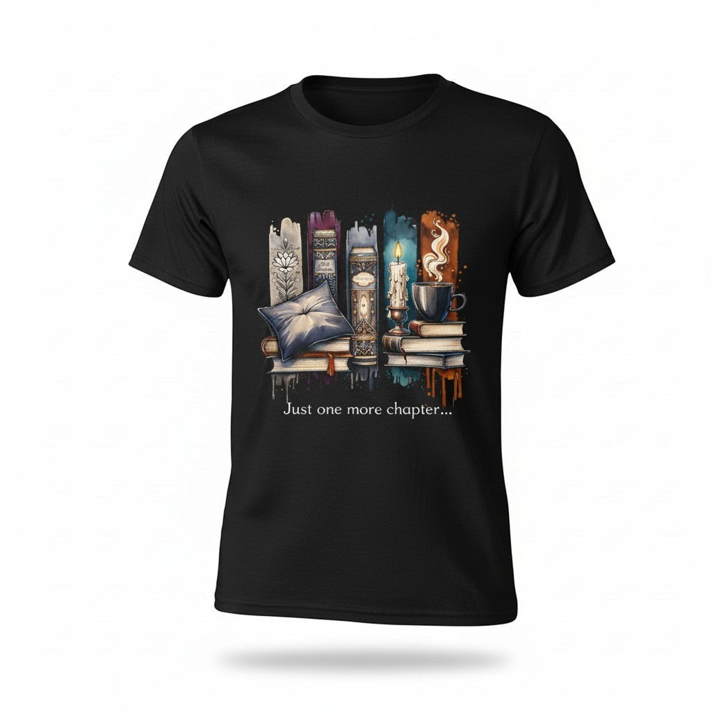 Black t-shirt with a graphic design of books, a pillow, and a cup with the text 'Just one more chapter. A perfect book lover gift.