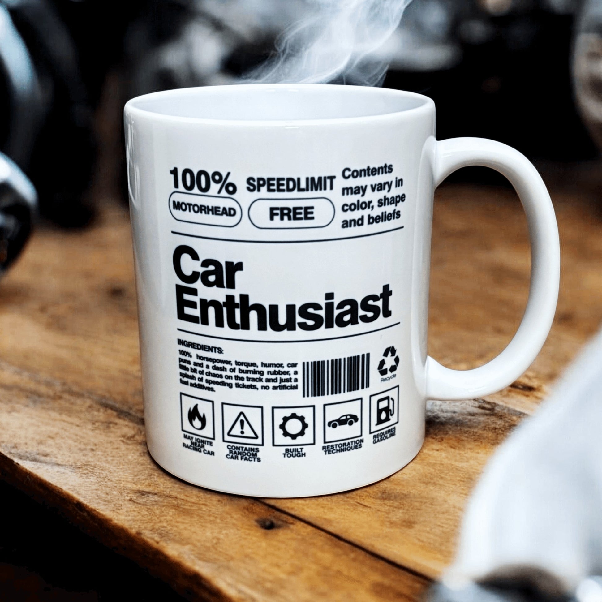 white ceramic mug hand pressed showing black writing on car enthusiast