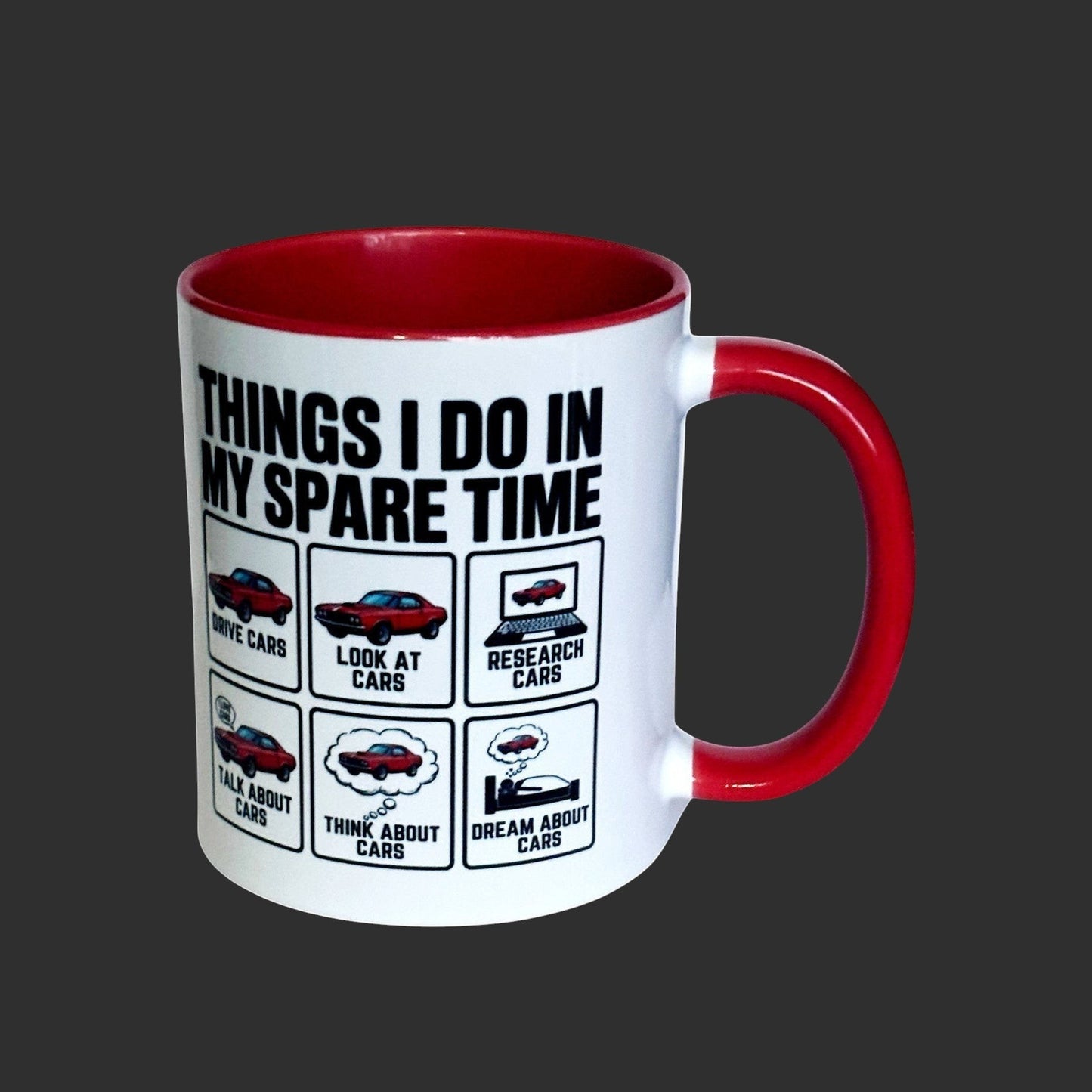 Angled view of a two-tone red and white ceramic mug  showing black writing  and colourful car icons