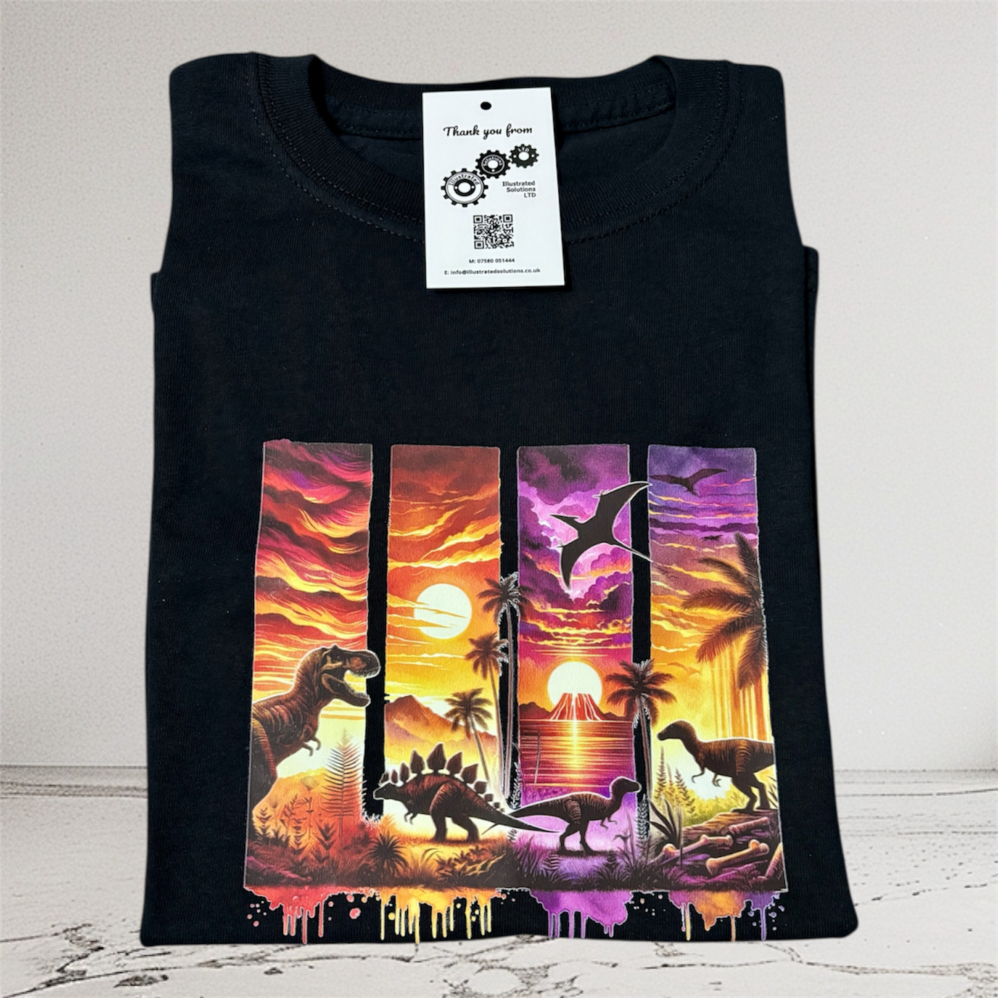 Dinosaur kids t-shirt with colourful dinosaur print on black fabric hand printed UK