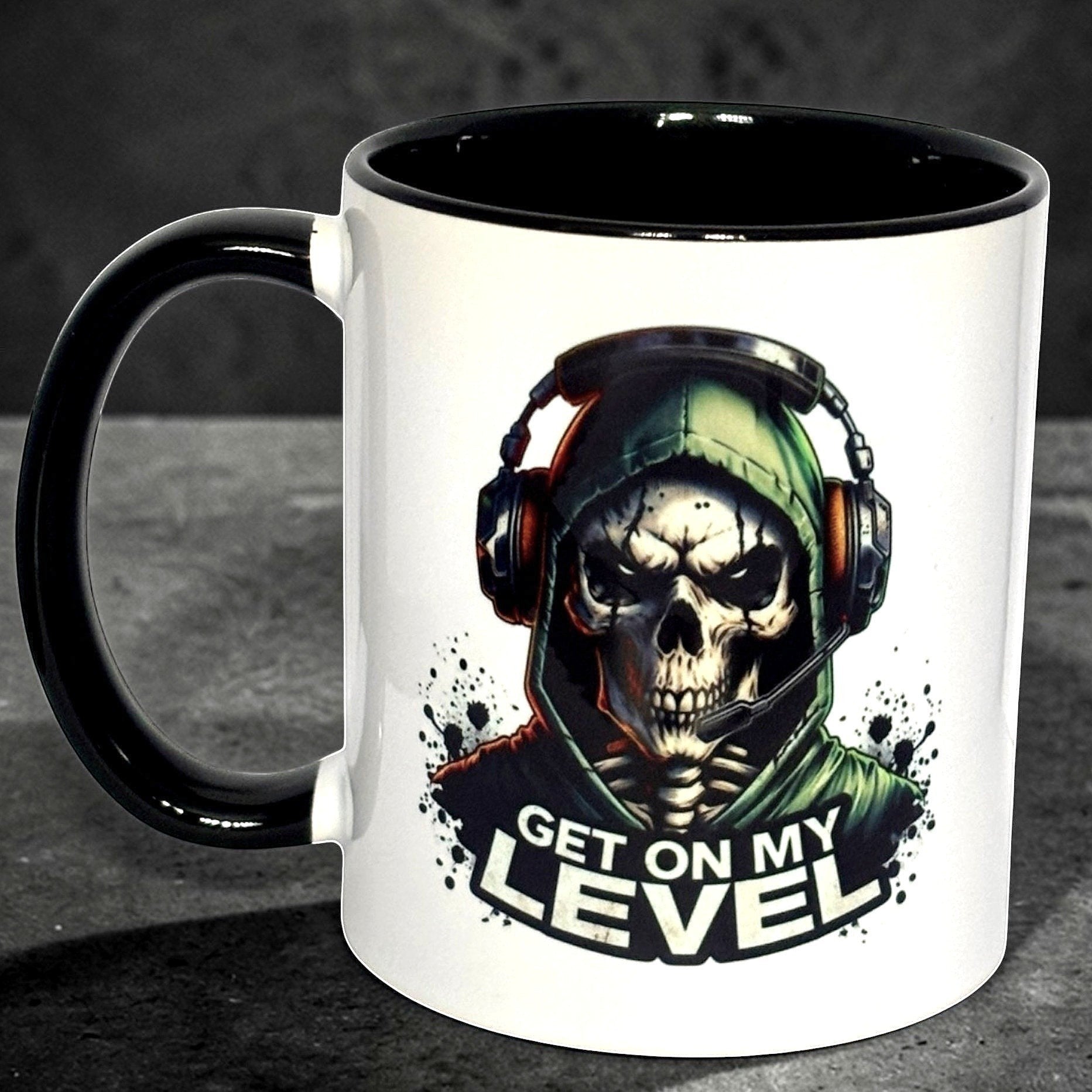 Close up of 2 Tone Black Mug with skull design and text 'Get on my level'