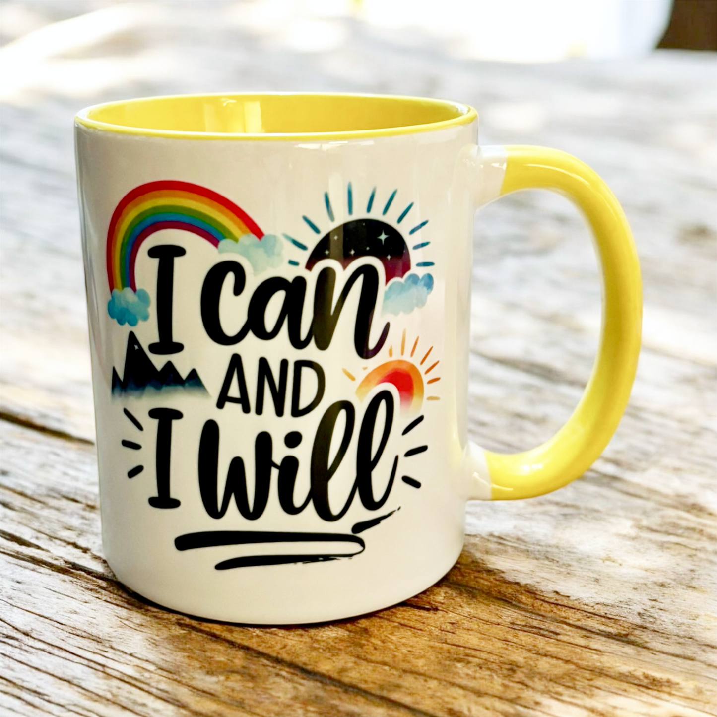 hand printed in the UK yellow inner and handle 2 tone ceramic mug with motivational message  close up