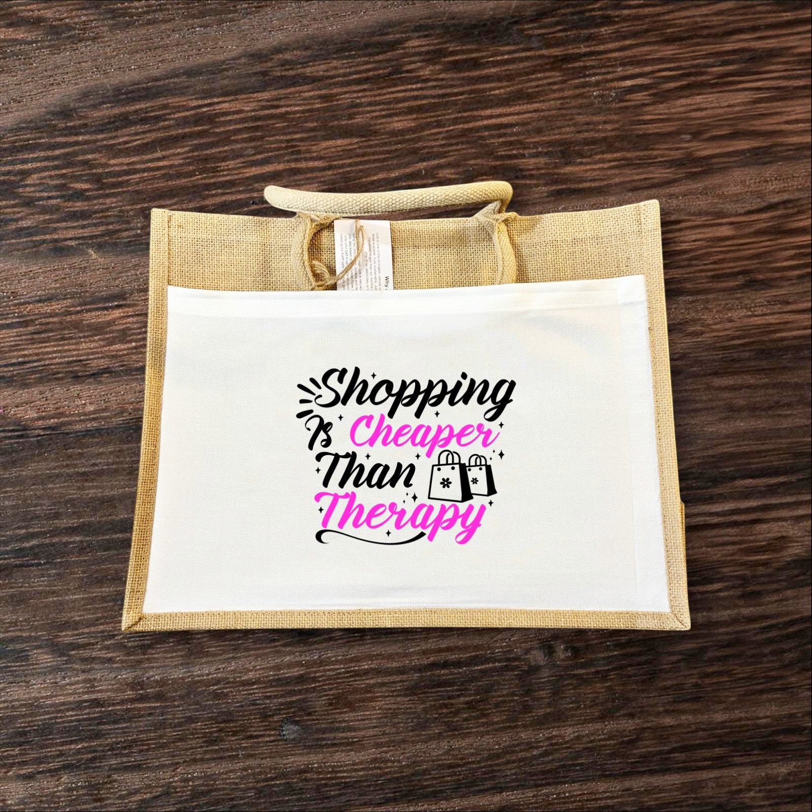 Jute bag with Shopping Cheaper than Therapy printed on front white pocket hand printed UK