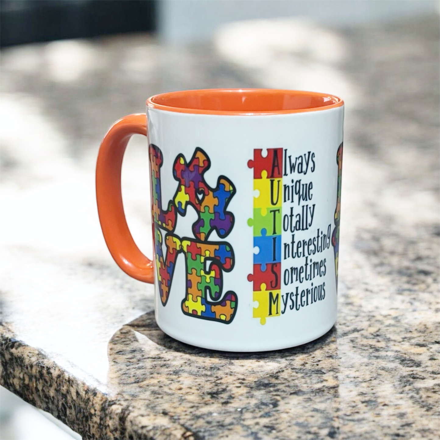 hand printed in the UK Orange 2-tone ceramic mug with Love  Autism message on