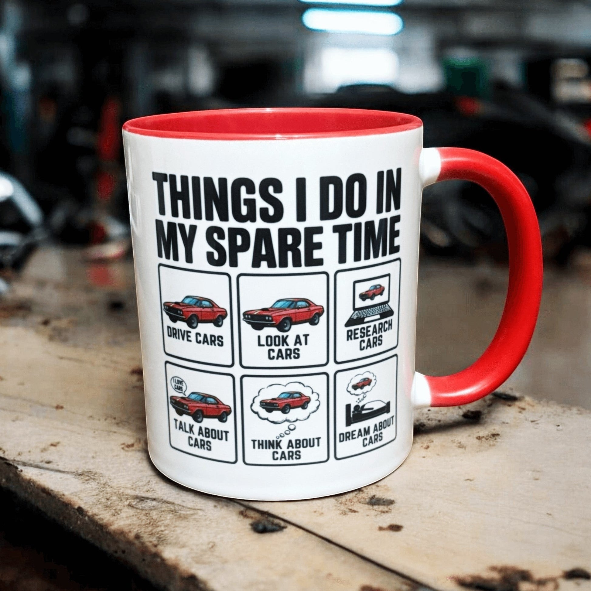 two tone red and white ceramic mug  showing black writing  and colourful car icons