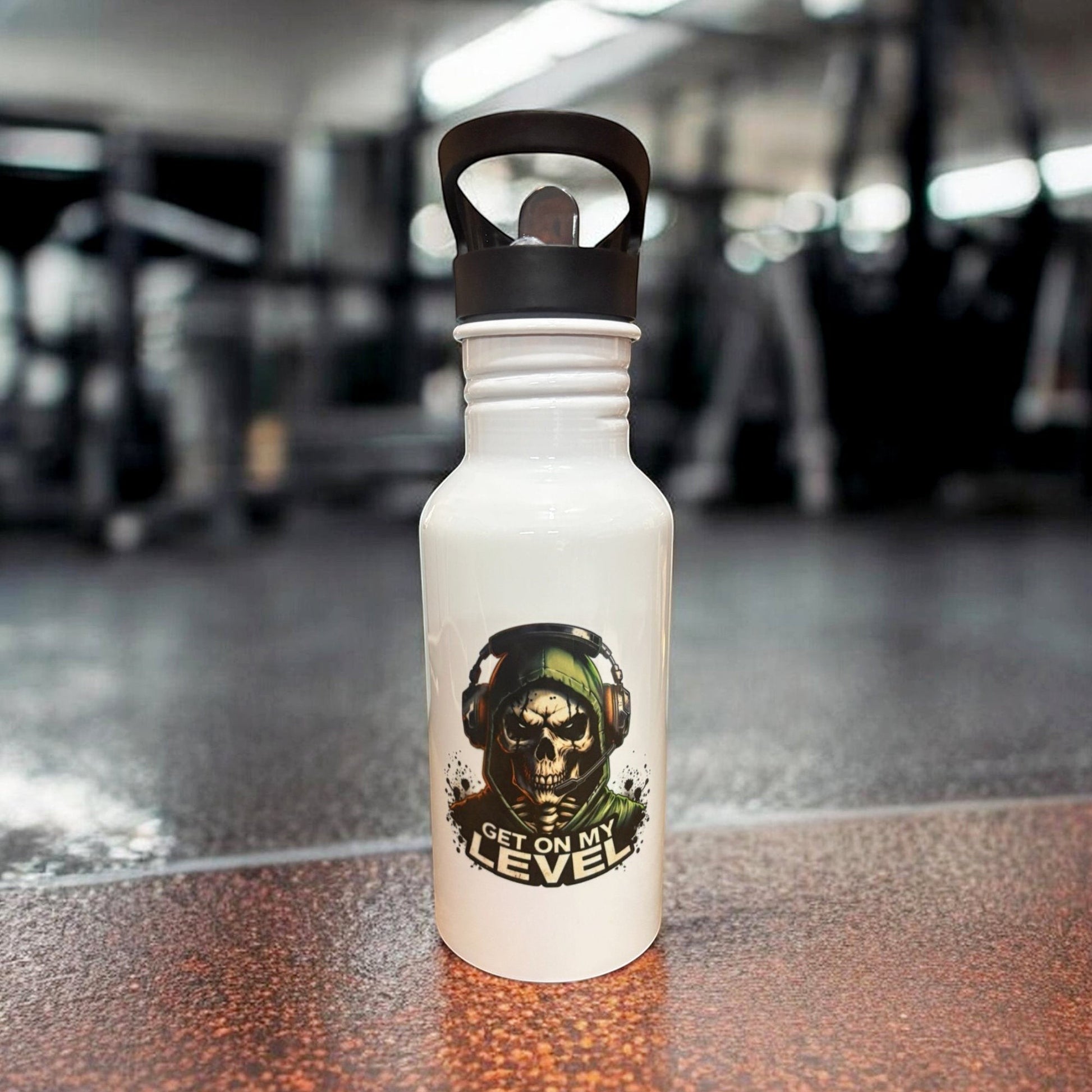 metal water bottle with skull and get on my level graphic on gym background