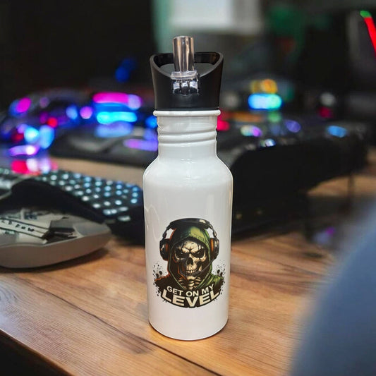 metal water bottle with skull and get on my level graphic on gaming desk