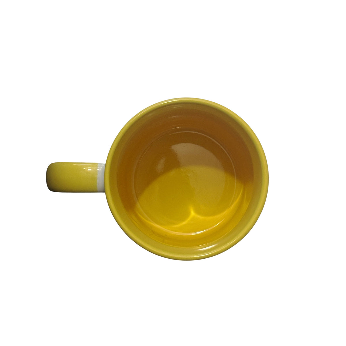 A yellow ceramic mug shown from a top-down view, highlighting its glossy yellow interior and yellow handle, set against a plain white background.