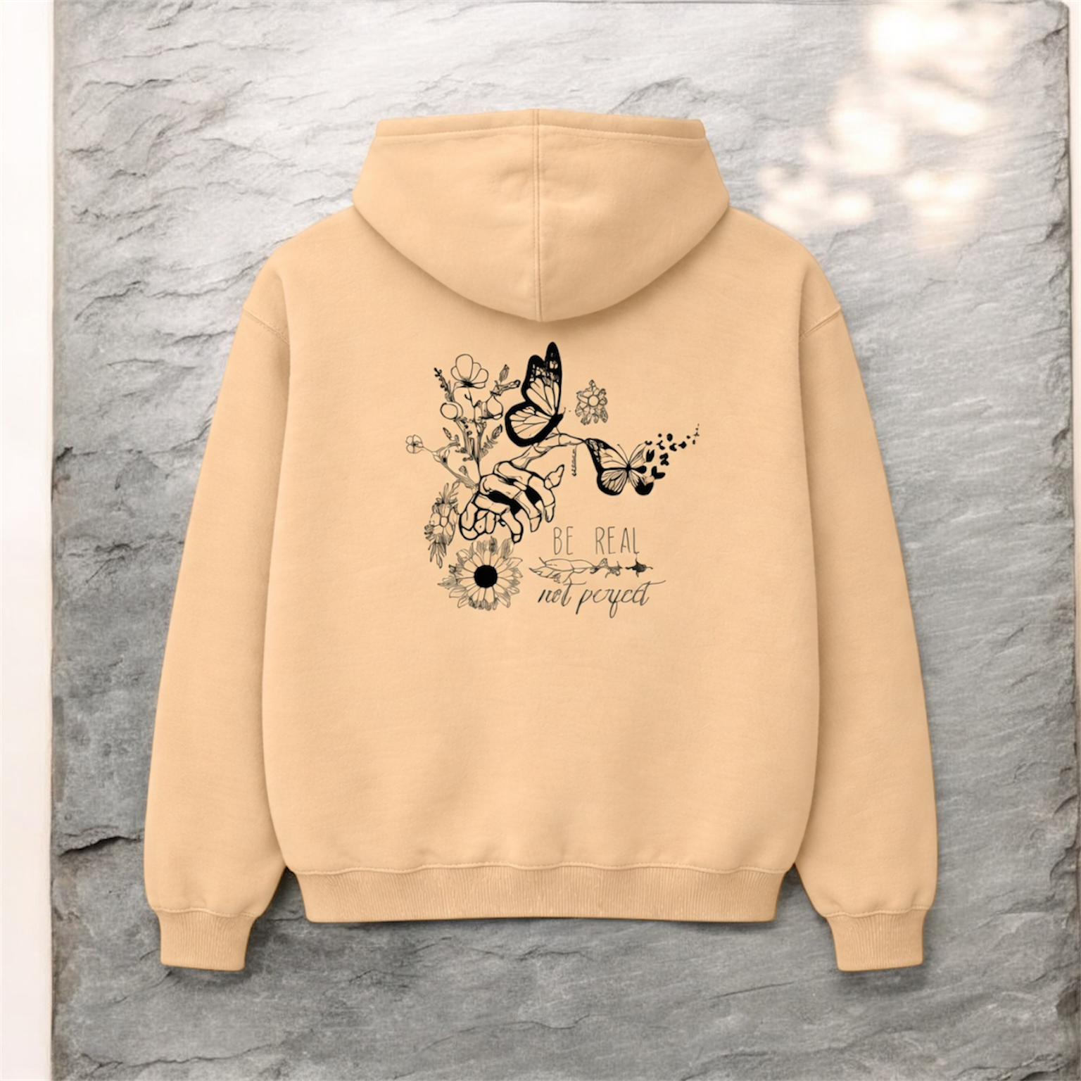 Pressed by hand in the UK Sand hoodie with a floral and butterfly design on the back