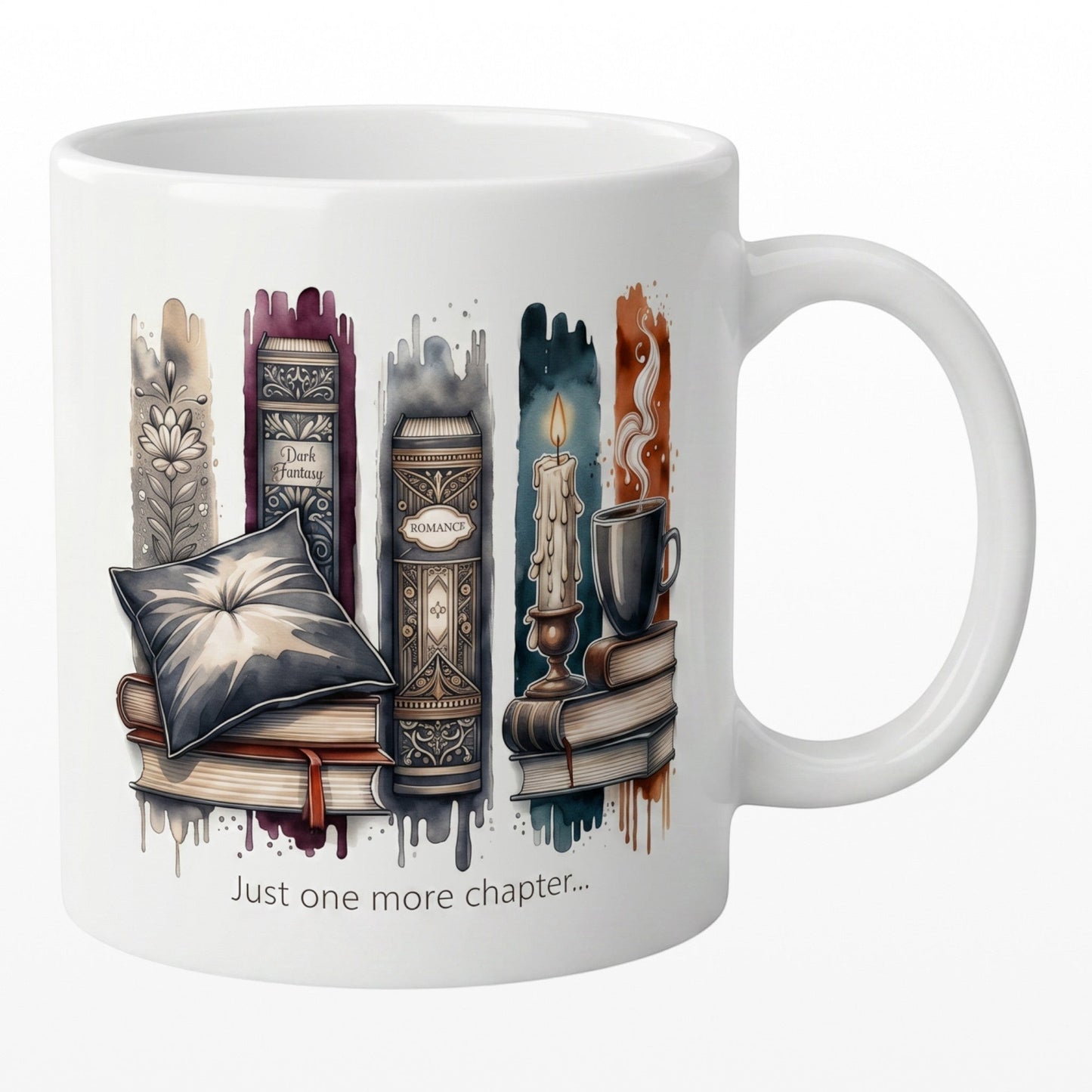 White ceramic mug featuring colorful book-themed artwork and Just One More Chapter text. A perfect book lover gift.