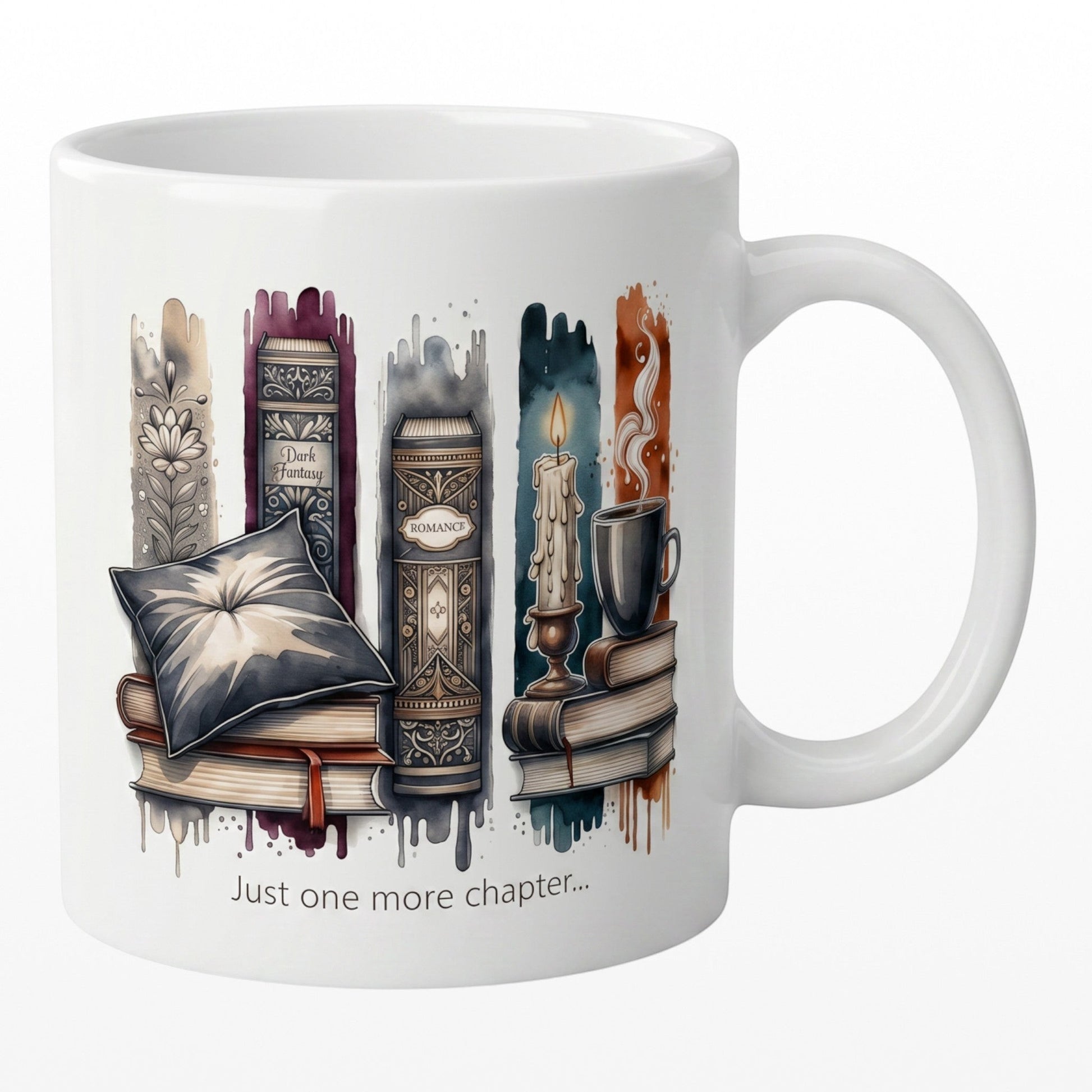 White ceramic mug featuring colorful book-themed artwork and Just One More Chapter text. A perfect book lover gift.
