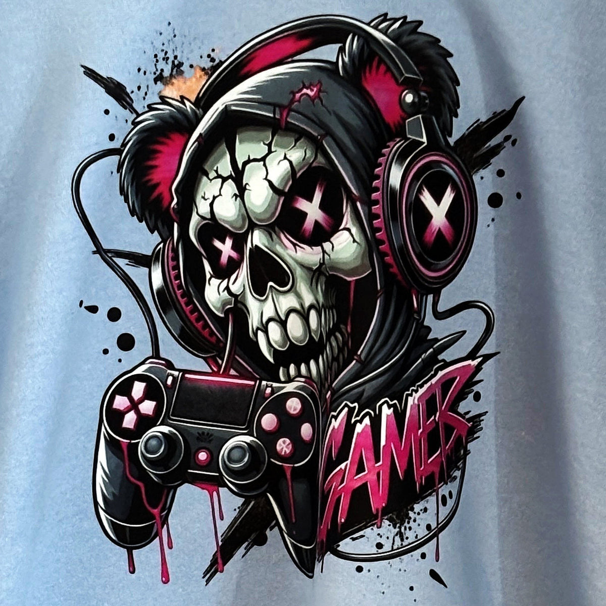 close up of skull gamer image on light blue hoodie