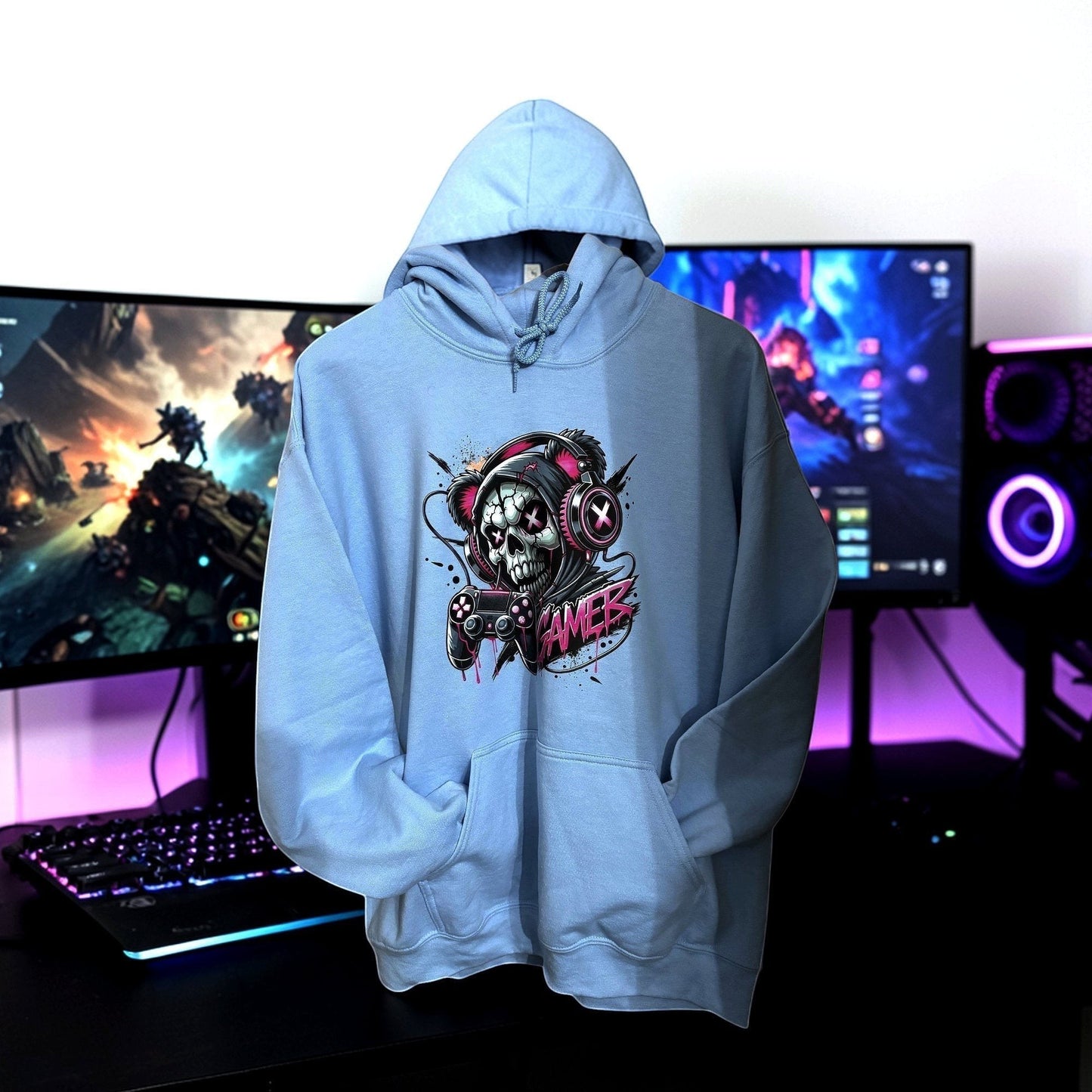 light blue hoodie with skull gamer image in games room