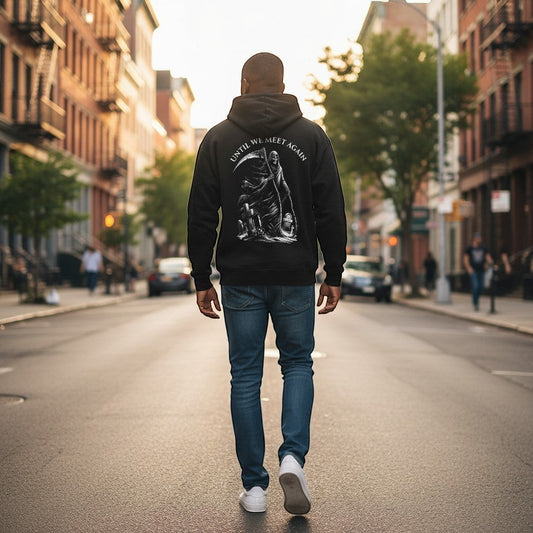Illustrated Solutions Store black limited edition gothic hoodie with reaper artwork and "Until We Meet Again" text.