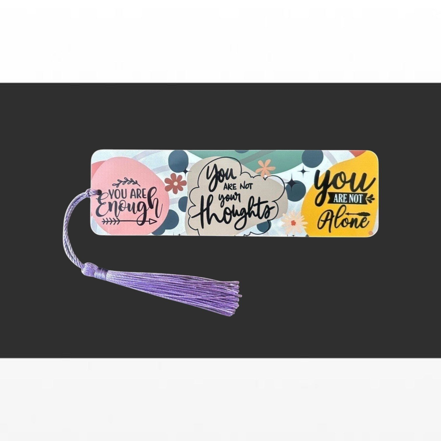 Illustrated Solutions Store metal bookmark with colourful affirmation quotes and a purple tassel for book lovers.