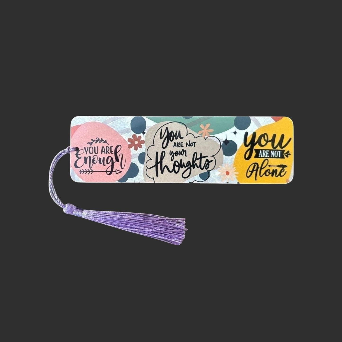 Illustrated Solutions Store metal bookmark with colourful affirmation quotes and a purple tassel for book lovers.