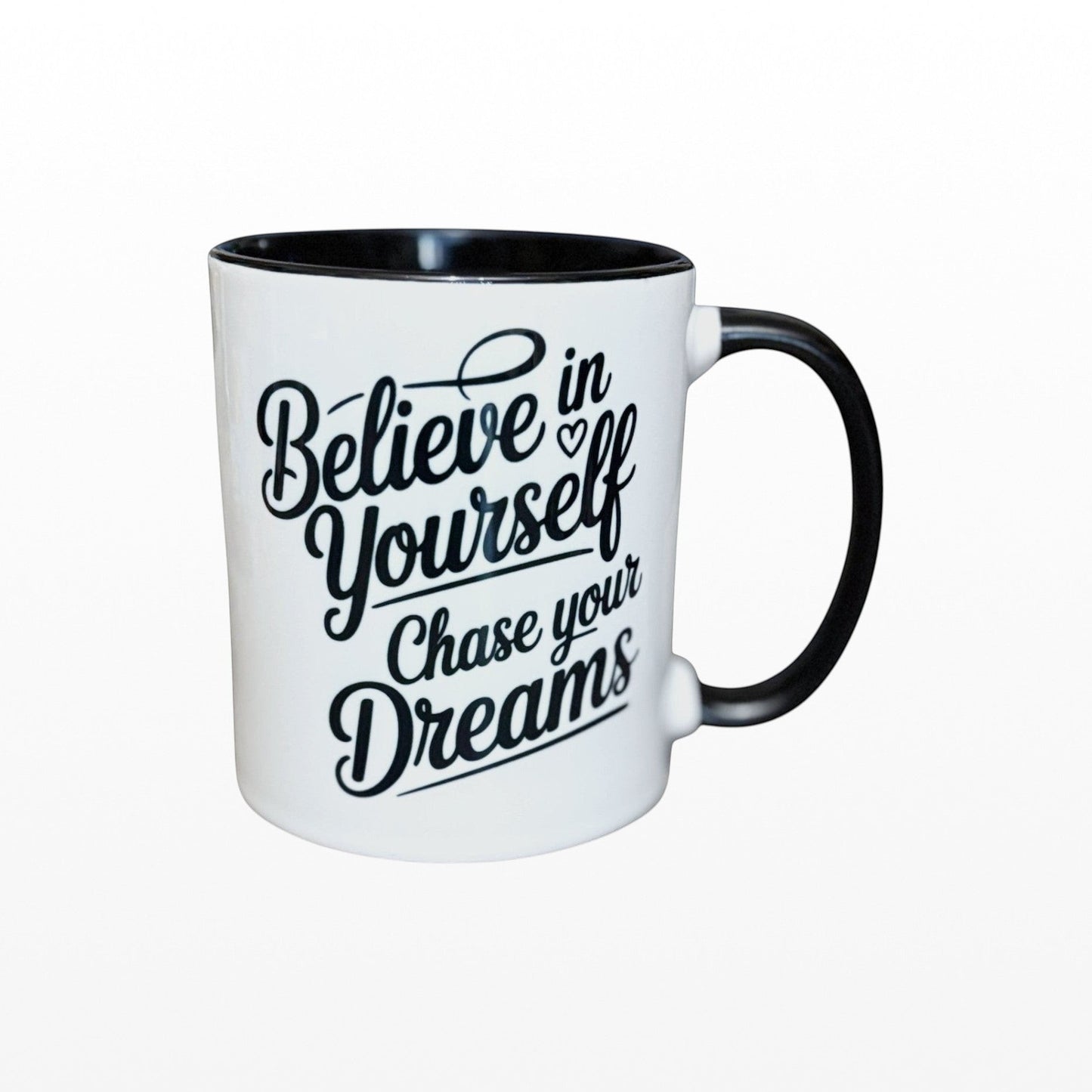 Illustrated Solutions Store white ceramic mug with black interior and handle, featuring 'Believe in Yourself Chase your Dreams' text.
