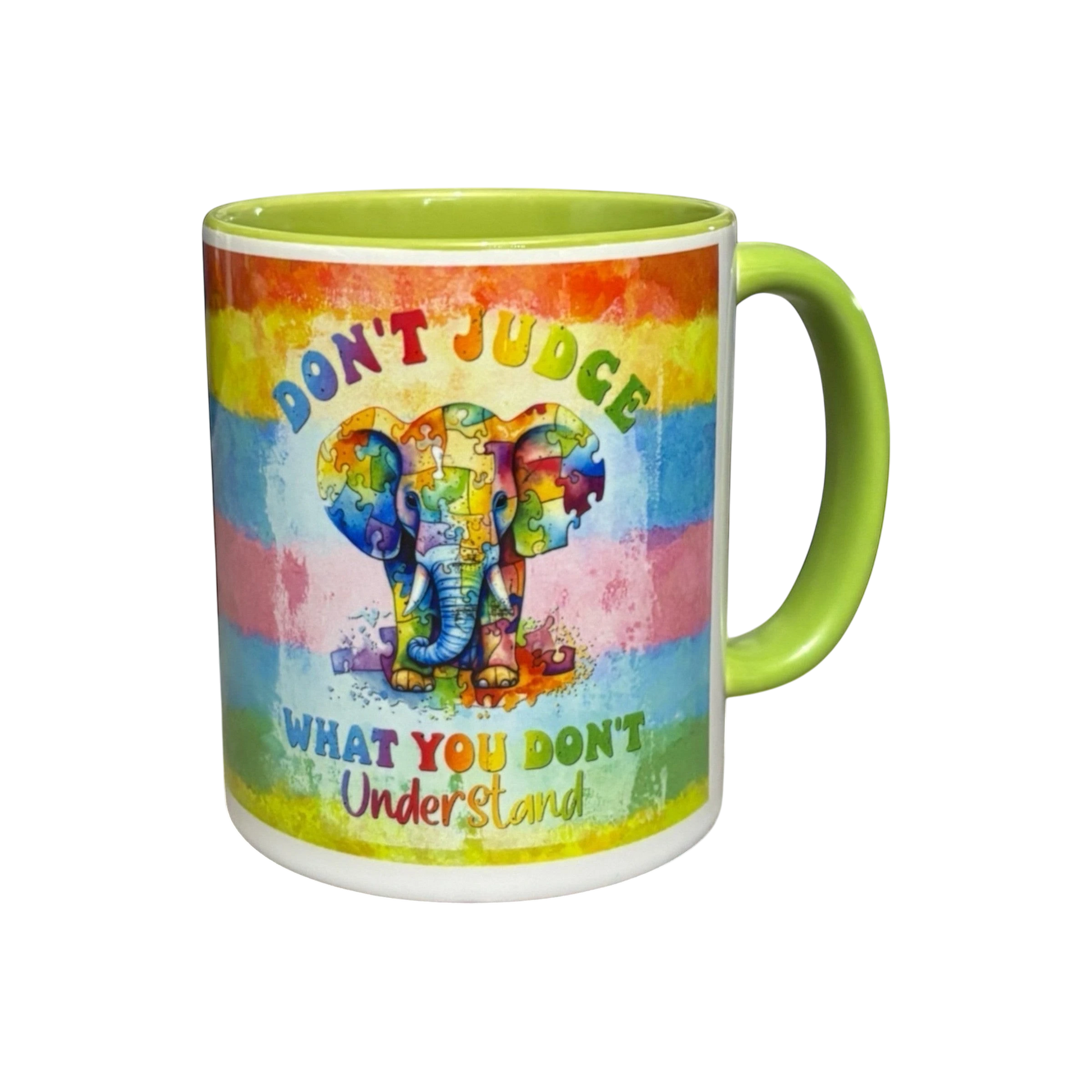 Illustrated Solutions Store 11oz ceramic mug with lime green handle and autism awareness elephant puzzle design.