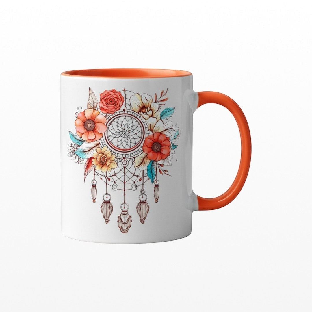 Illustrated Solutions Store 11oz ceramic mug with a boho floral dreamcatcher design, orange handle, and glossy finish.