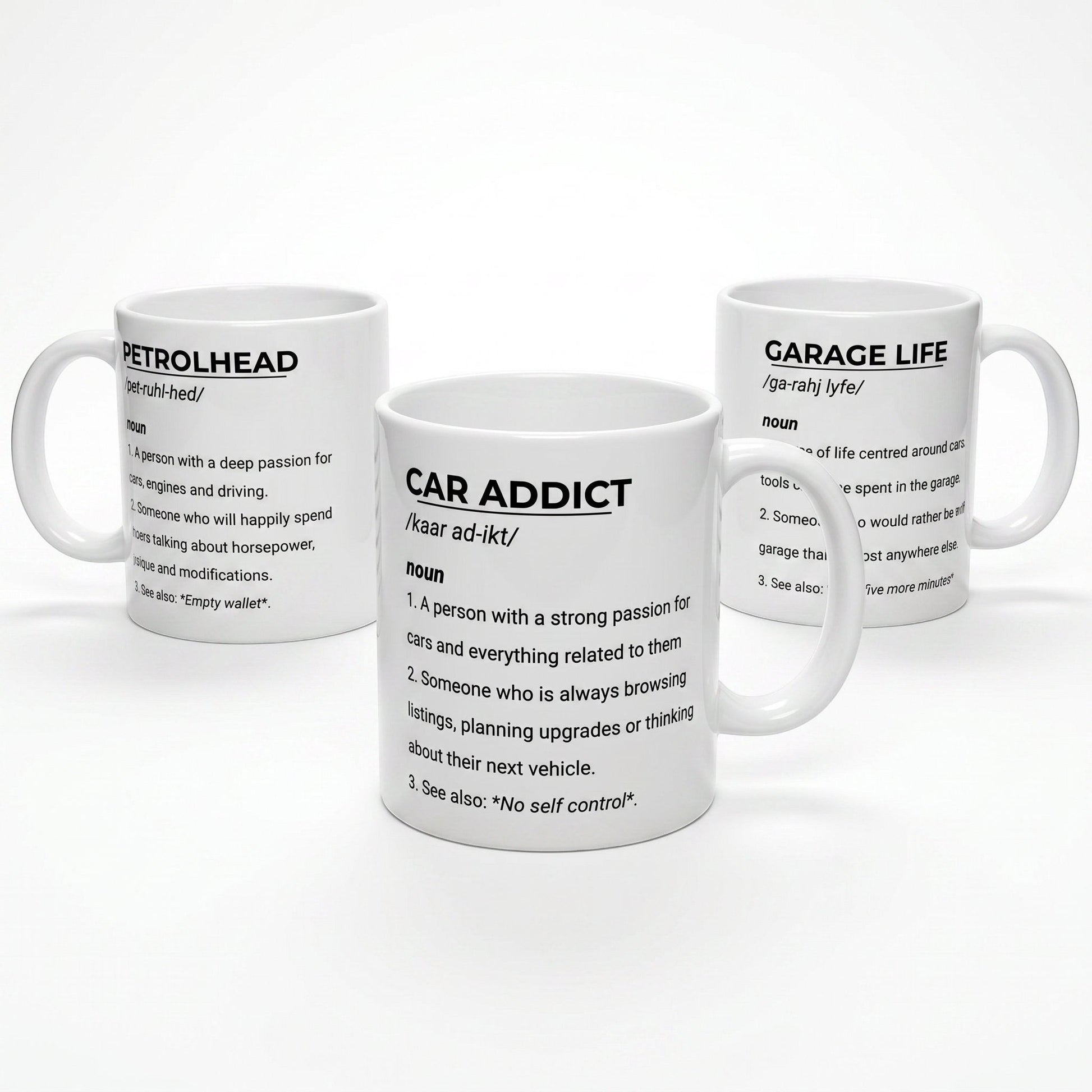Illustrated Solutions Store ceramic mugs featuring dictionary-style definitions for Petrolhead, Car Addict, and Garage Life.