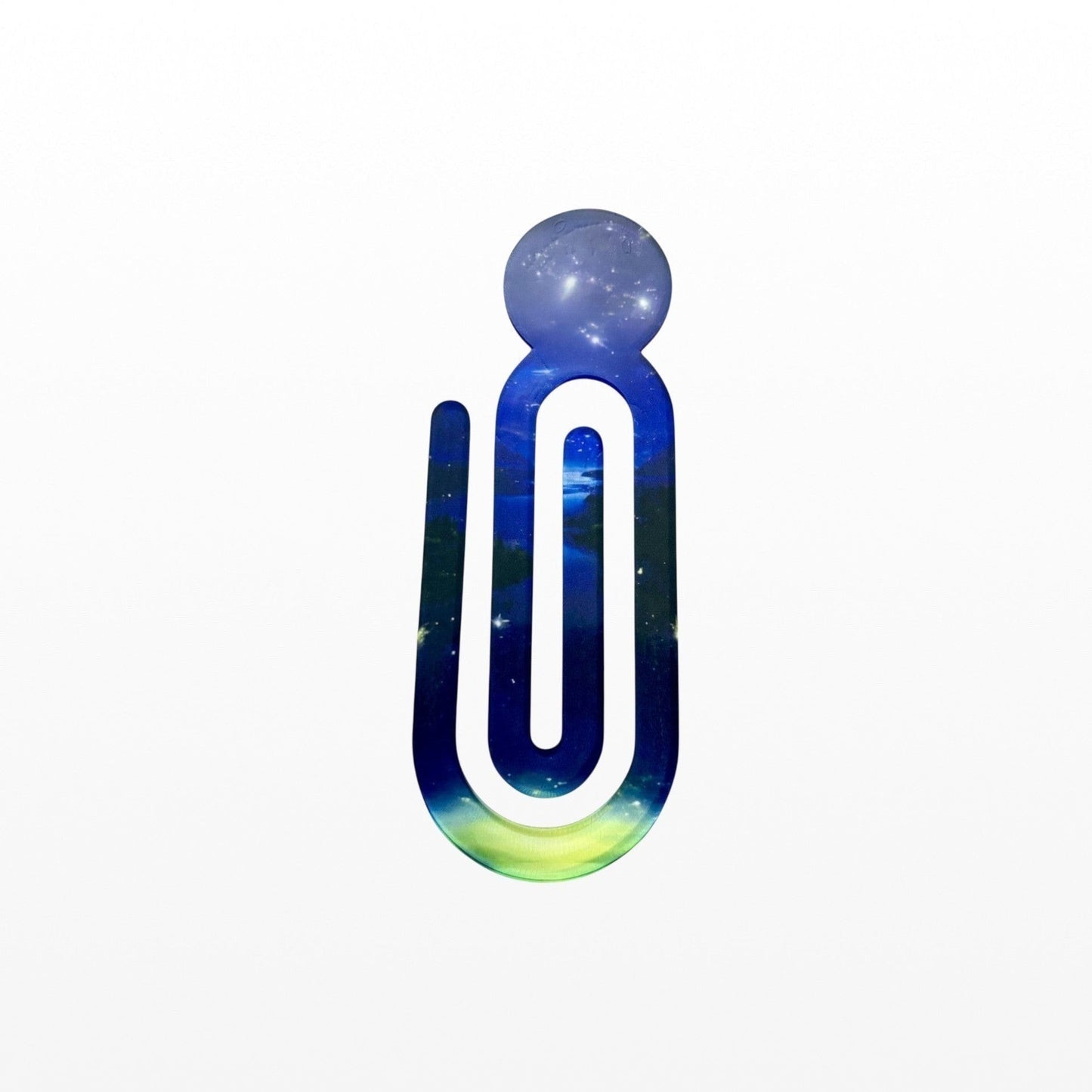 Illustrated Solutions Store acrylic book clip featuring a vibrant blue and green stars and moon celestial design.
