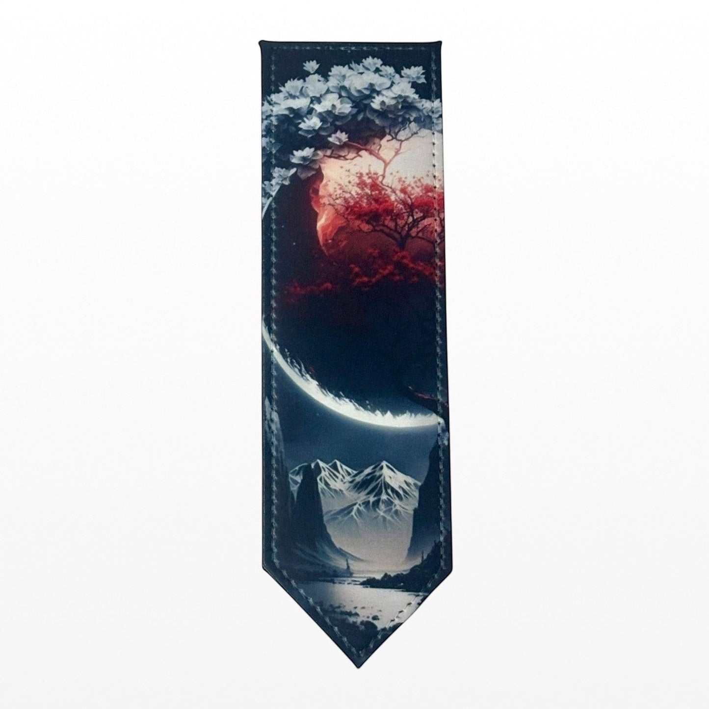Illustrated Solutions Store crimson moon leather bookmark with mountain landscape and glowing moon. Gothic fantasy design.