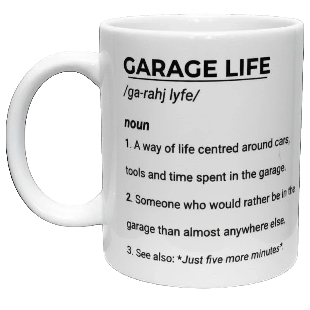 Illustrated Solutions Store white ceramic mug with black text defining "Garage Life" as a noun, perfect for car enthusiasts.