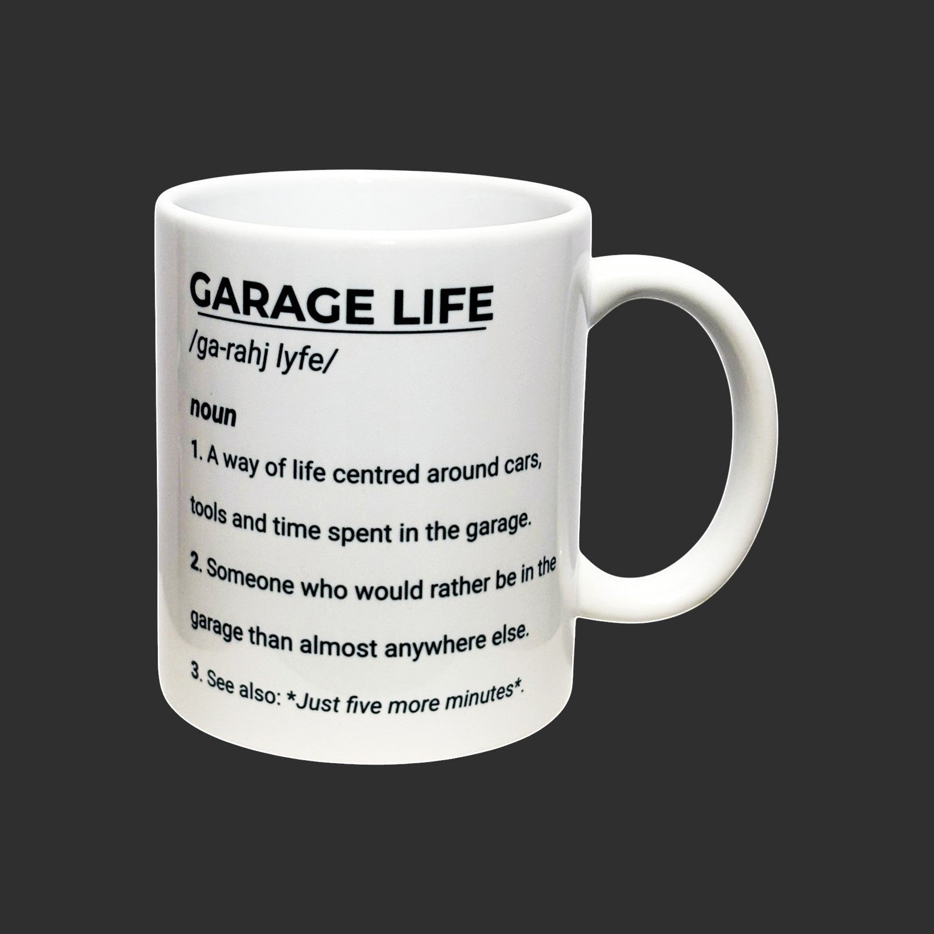 Illustrated Solutions Store white ceramic mug with black text defining "Garage Life" as a way of life centred around cars, tools, and time spent in the garage.