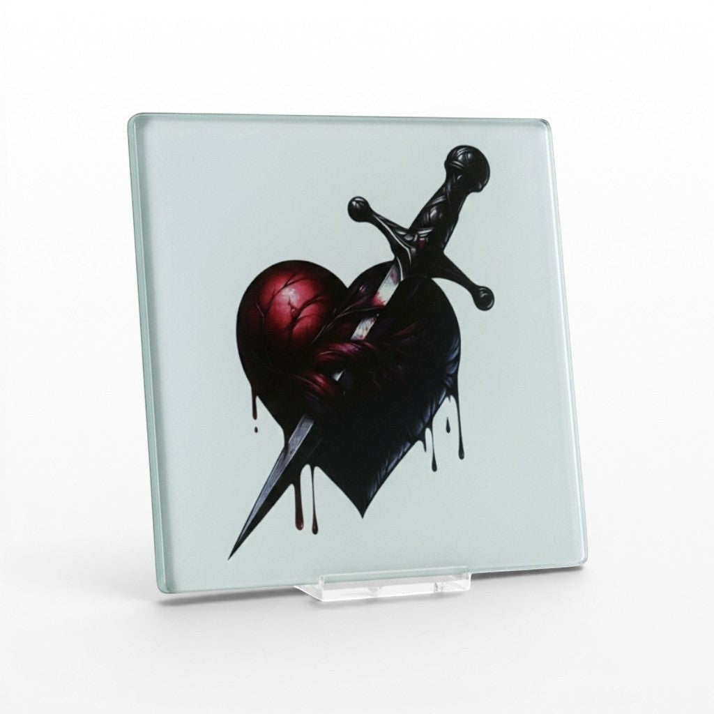 Illustrated Solutions Store gothic glass square coaster with a bleeding heart pierced by a dagger.