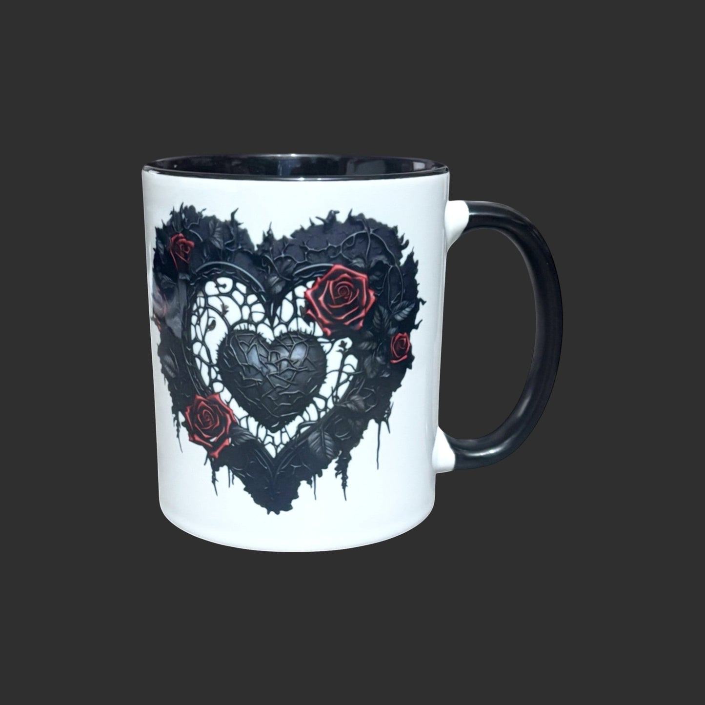 Illustrated Solutions Store Gothic Love Heart mug with black thorny vines and red roses design on white ceramic.