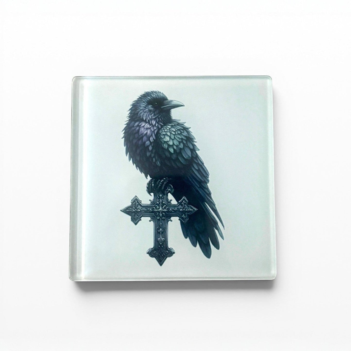 Illustrated Solutions Store gothic glass coaster with a black raven perched on an ornate cross.