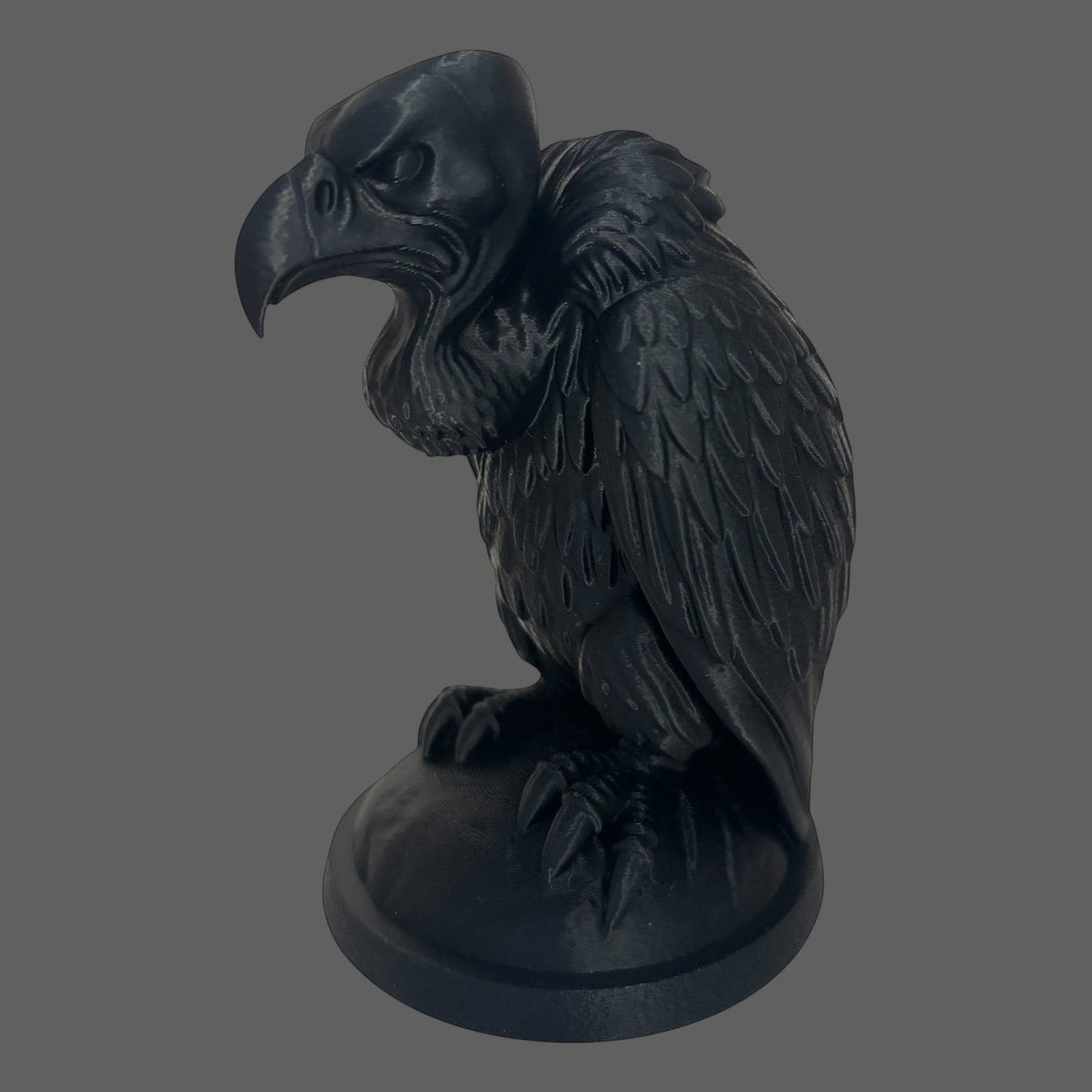 Illustrated Solutions Store black gothic vulture figurine with detailed feathers and menacing expression, perched on a base.