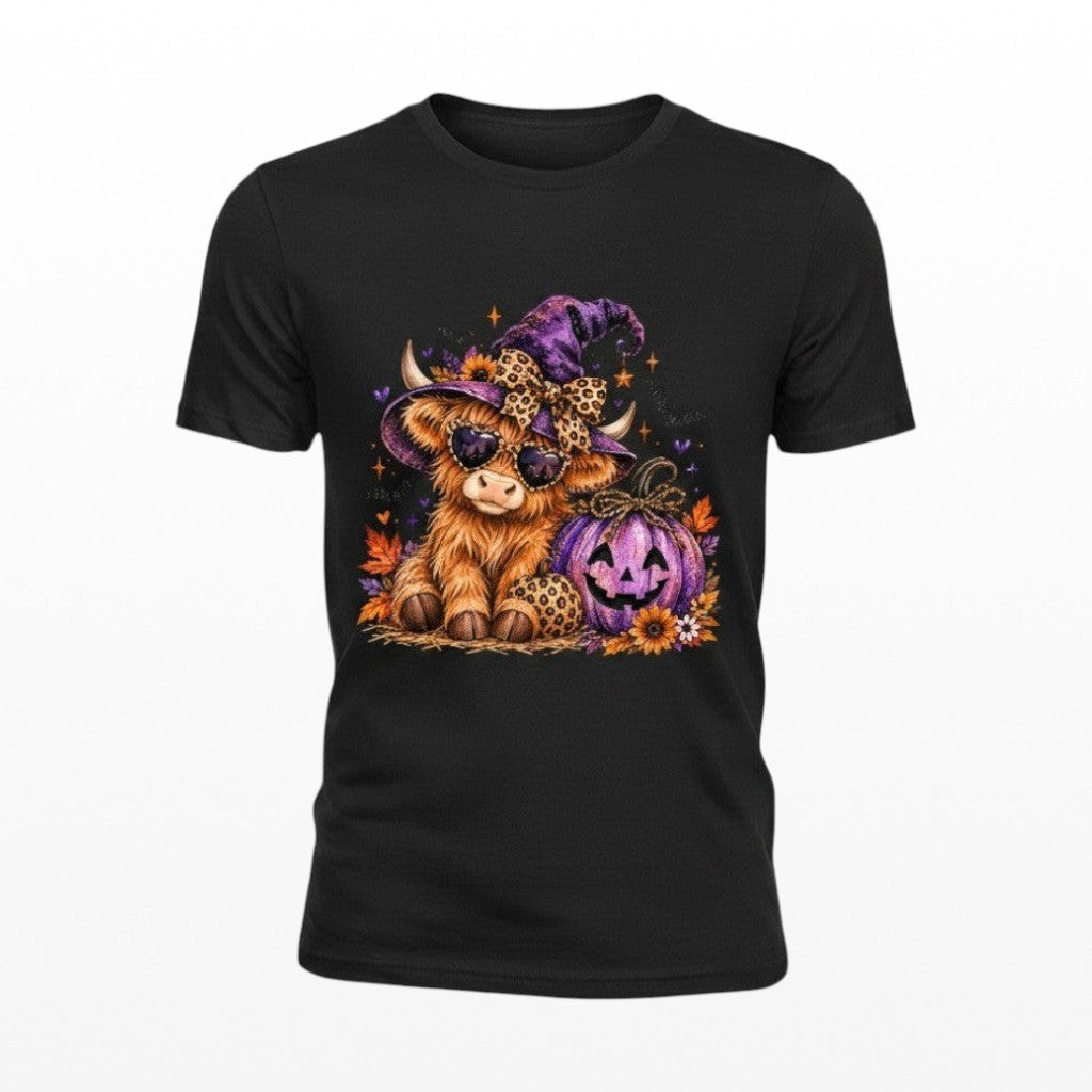 Illustrated Solutions Store black unisex t-shirt featuring a fluffy Highland cow in a witch hat and sunglasses.