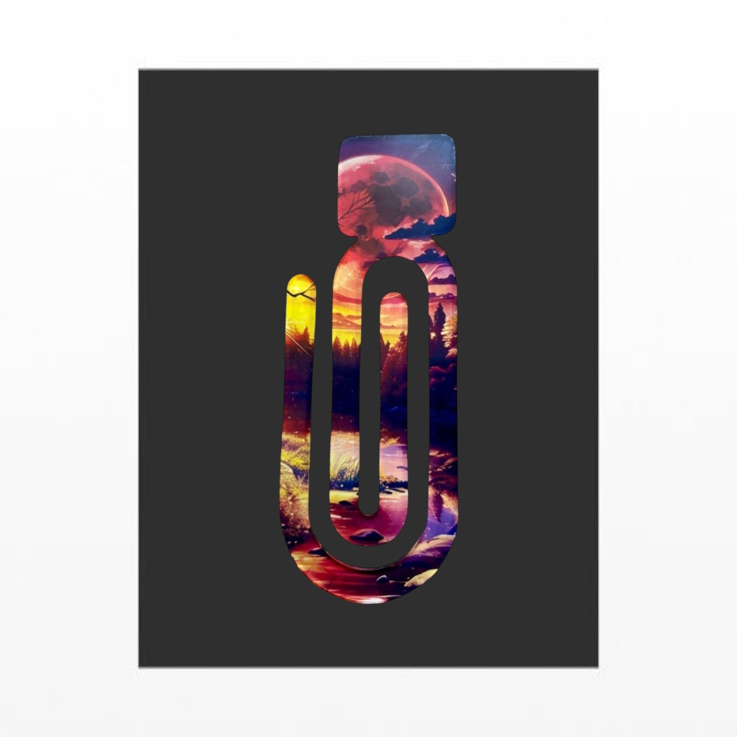 Illustrated Solutions Store Into The Woods acrylic book clip with a vibrant forest sunset and moon design.