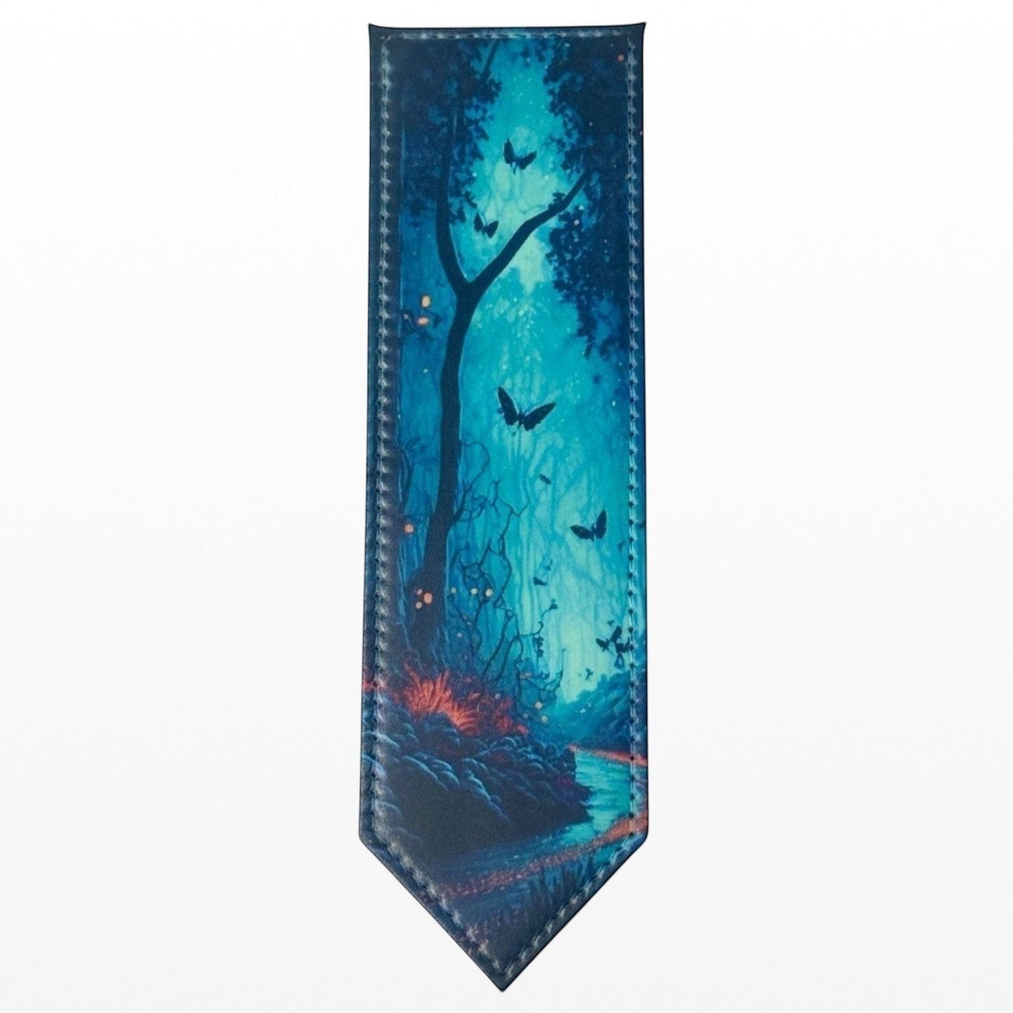 Illustrated Solutions Store leather bookmark with a mystical forest scene in deep teal, featuring glowing fireflies and butterflies.
