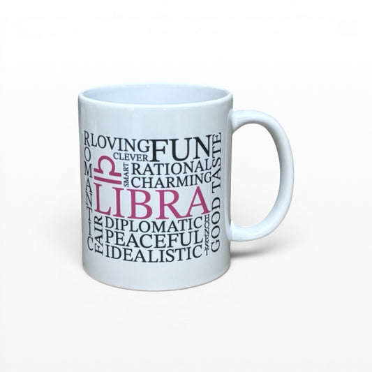 Illustrated Solutions Store Libra zodiac mug with personality traits like fun, charming, and diplomatic. White ceramic mug.